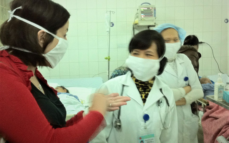Health care workers wearing cloth masks