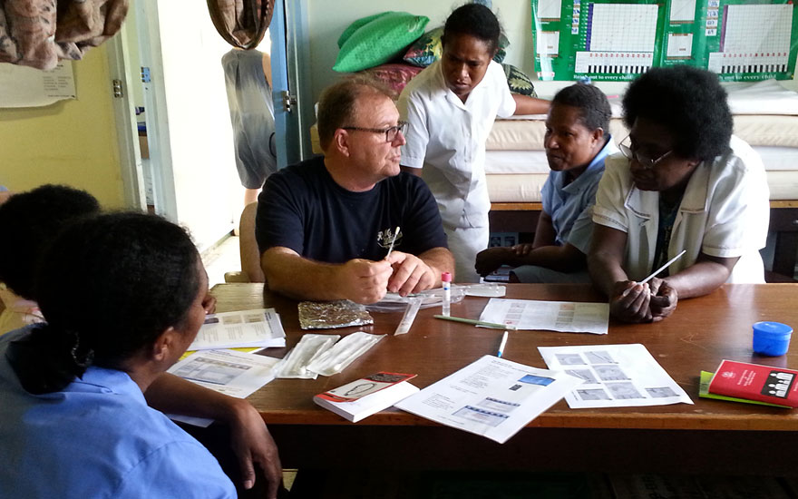 Dr Steve Badman training researchers in Papua New Guinea
